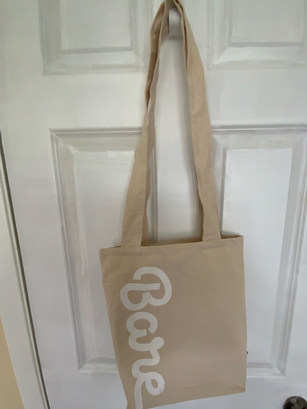 Beige Canvas Tote Bag with White Script Logo